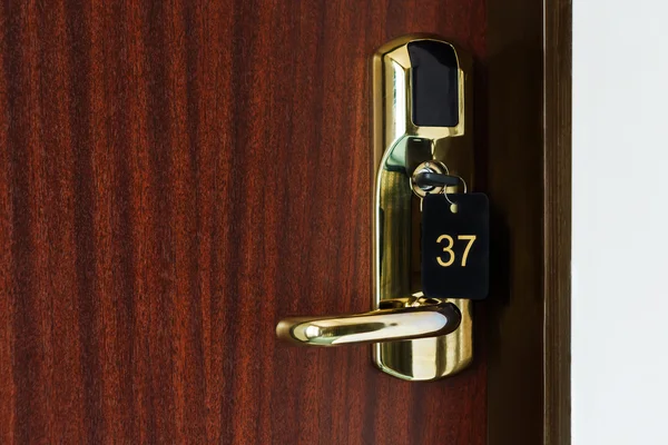 Half open door of a hotel bedroom — Stock Photo, Image