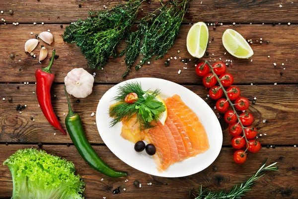 Fish - salted salmon sliced on a plate — Stock Image Fish - salted salmon sliced on a plate Stock Photo