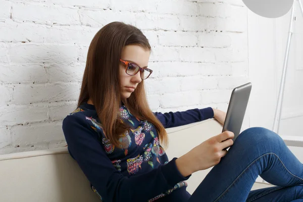 Teenager girl with tablet pc relax at home