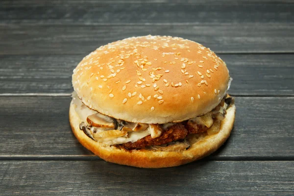 Meet and cheese burger at rustic wood — Stock Photo, Image