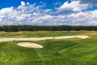Golf course landscape with sand bankers.