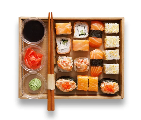 Set of sushi maki and rolls at box isolated. — Stok fotoğraf