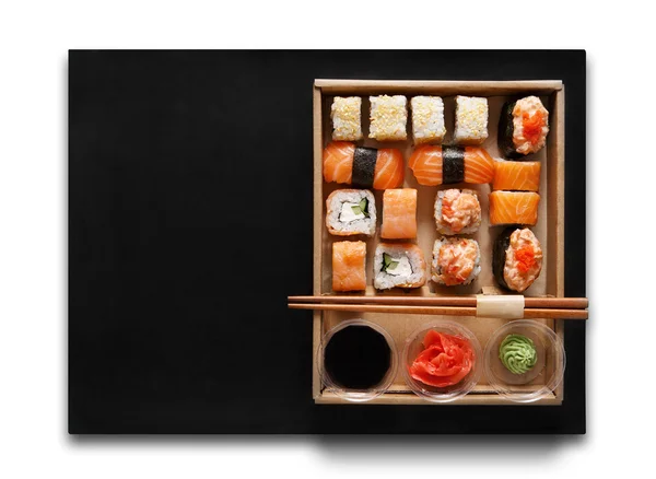 Set of sushi maki and rolls at box isolated. — Stock Photo, Image