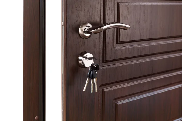 Open brown wooden door handle with lock. — Stock Photo, Image