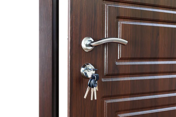 Open brown wooden door handle with lock. — Stock Photo, Image