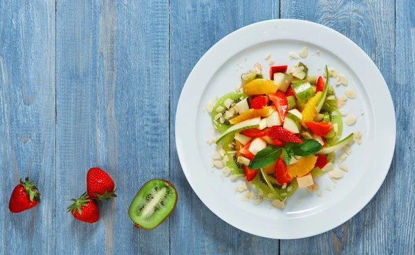 Fruit salad closeup, vegan food.