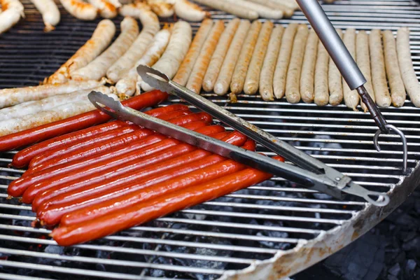 Street fast food, grilled sausages at bbq — Stock Photo, Image