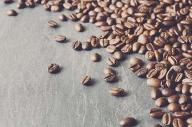 Kahve çekirdekleri kopya alanı, arka plan ile taş