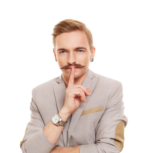 Young man with mustache isolated at white — Stockfoto