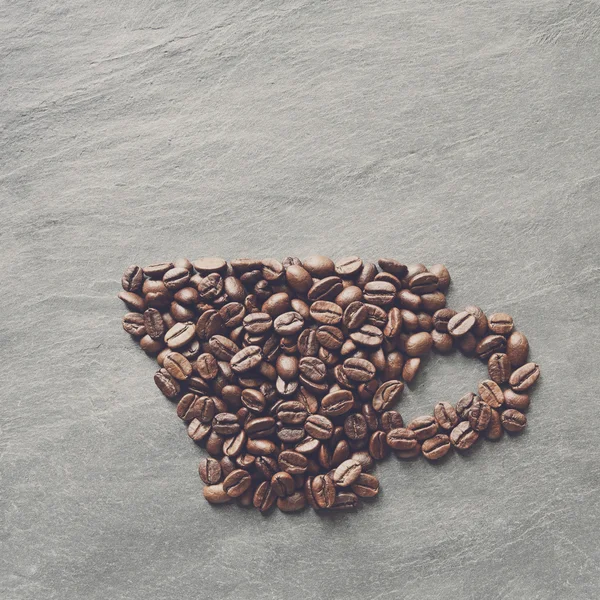 Coupe de grains de café à fond de pierre — Photo