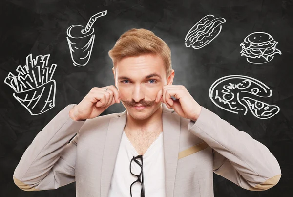Handsome man and fast food temptation — Stock Photo, Image