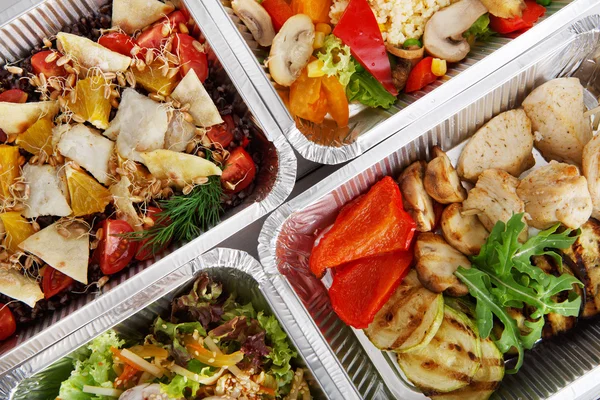 Healthy food take away in boxes, top view at wood — Stock Photo, Image