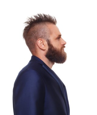 Young bearded man profile portrait isolated at white