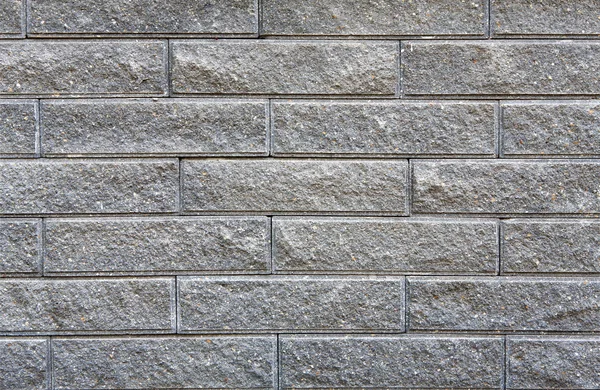 Gray rough brick wall background — Stock Photo, Image