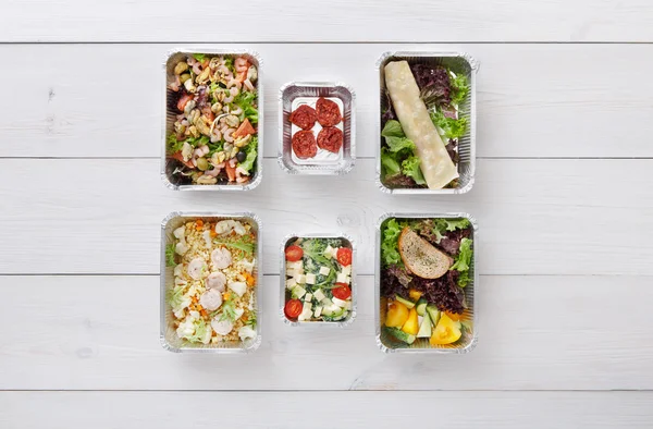 Comida saludable para llevar en cajas, vista superior a la madera —  Fotos de Stock