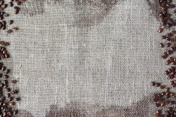 Texture toile de jute avec bordure de grains de café — Photo
