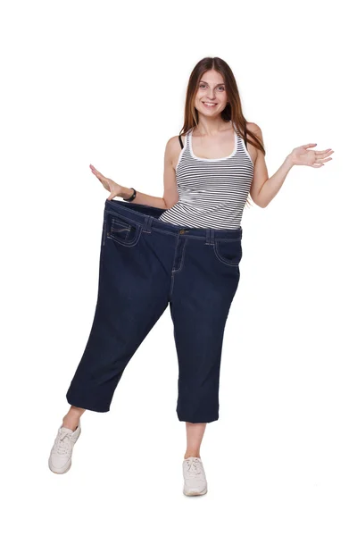 Mujer joven feliz de los resultados de dieta de pérdida de peso, aislado — Foto de Stock