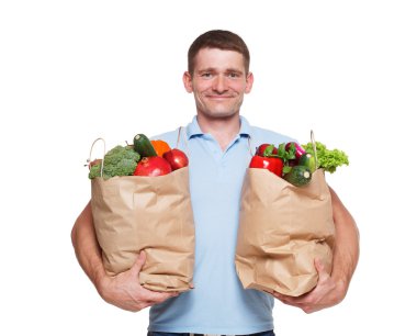 Mutlu bir adam tutmak sağlıklı gıda, izole bakkal alıcı ile çanta