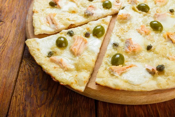 Delicious seafood pizza with olives — Stock Photo, Image