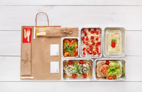 Healthy food take away in boxes, top view at wood — Stock Image Healthy food take away in boxes, top view at wood Stock Image