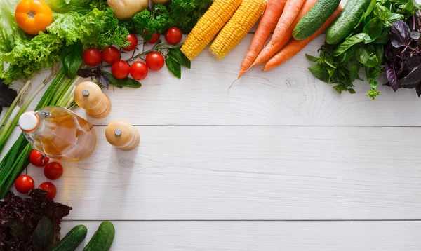 Fresh vegetables border on white wood background with copy space — Stock Photo, Image