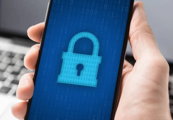 Person using mobile phone, padlock icon on blue screen — Stock Photo, Image