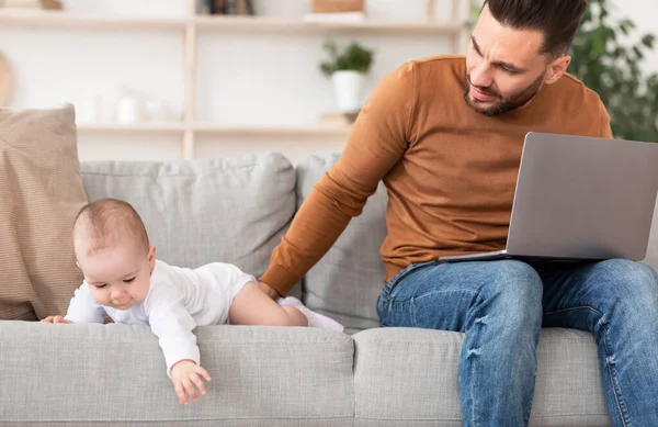 Father With Little Baby Using Laptop Working Remotely From Home — Stock Photo, Image