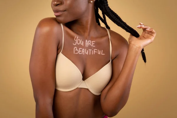 Youre Beautiful. Motivational Inscription Written On Chest Of Black Woman In Bra — Stock Photo, Image