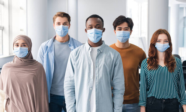 Diverse group of international people wearing face masks