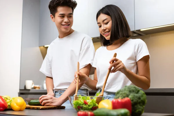 Happy Japanese Spouses Cooking Dinner Together In Modern Kitchen — Stock Photo, Image