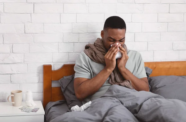 Sick African Man Suffering From Rhinitis At Home — Stock Photo, Image