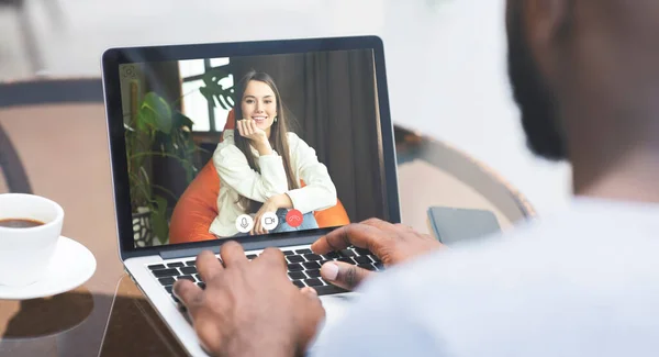 Man Making Video Call Chatting with Girlfriend Sitting In Cafe — стоковое фото