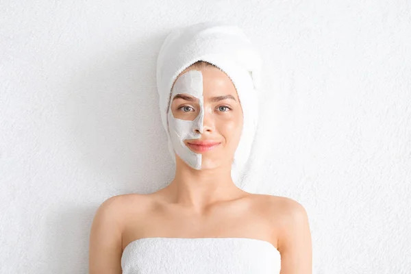 Top view of woman with mask on half of face — Stock Photo, Image