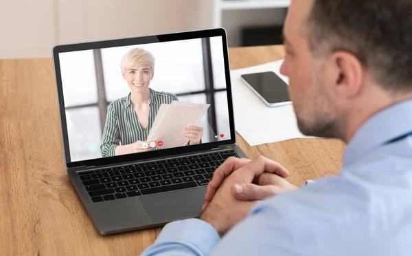 Unrecognizable man having videocall with his business partner, using laptop — Stock Photo, Image