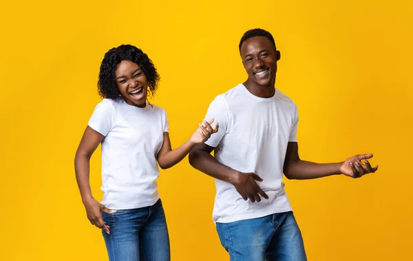 Joyful african american lovers having fun together, moving and screaming — Foto de Stock