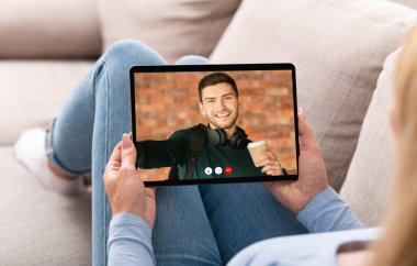 Girlfriend Making Video Call Talking With Boyfriend At Home, Cropped