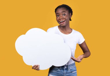 Black Young Lady Showing Blank Thought Bubble Yellow Background clipart