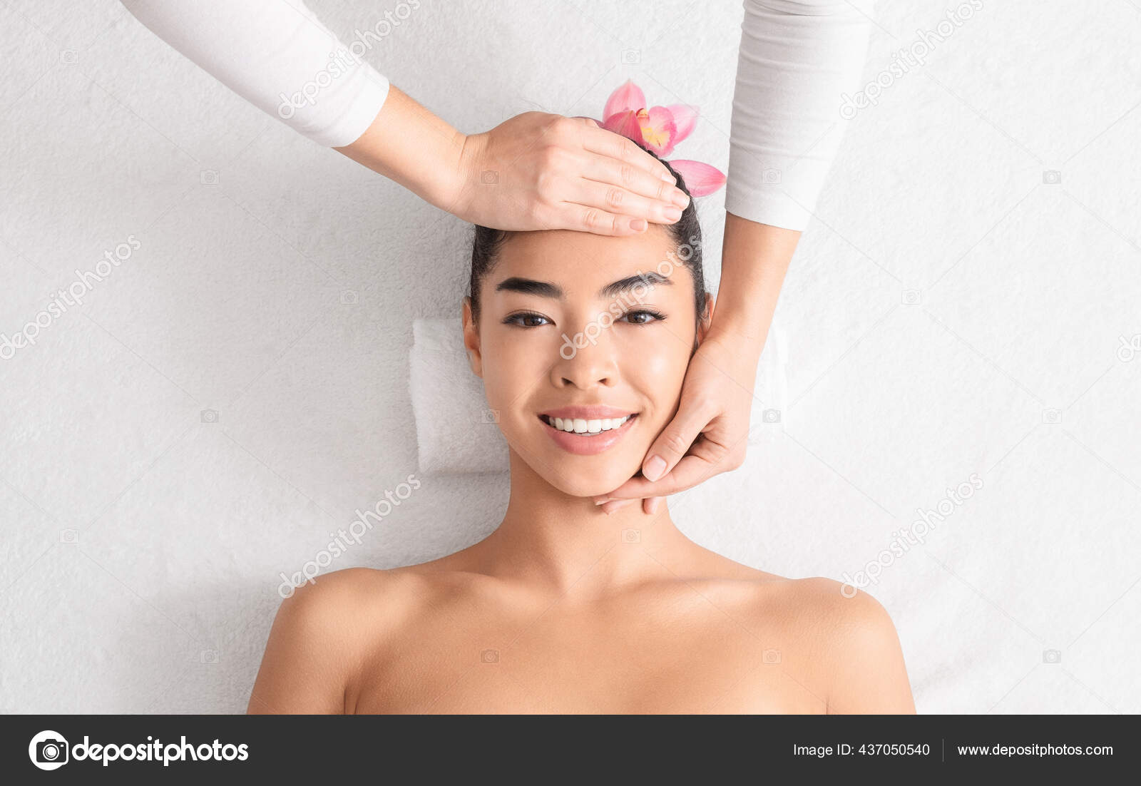 Relaxing Massage. Beautiful Asian Woman Enjoying Beauty Treatments At