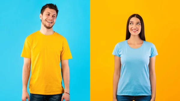 Retrato de casal alegre posando no fundo amarelo e azul — Fotografia de Stock