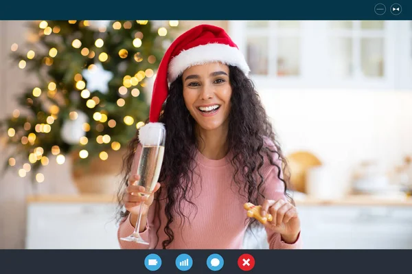 Happy young woman in santa hat celebrating christmas online, making video call — Stock Photo, Image