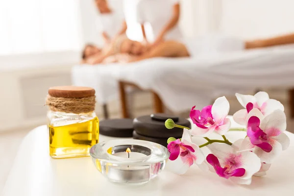 Couples Massage Spa Composition With Stones, Oil And Orchid Flowers — Stock Photo, Image