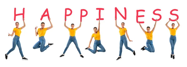 Woman jumping and holding letters forming word Happiness — Stock Photo, Image