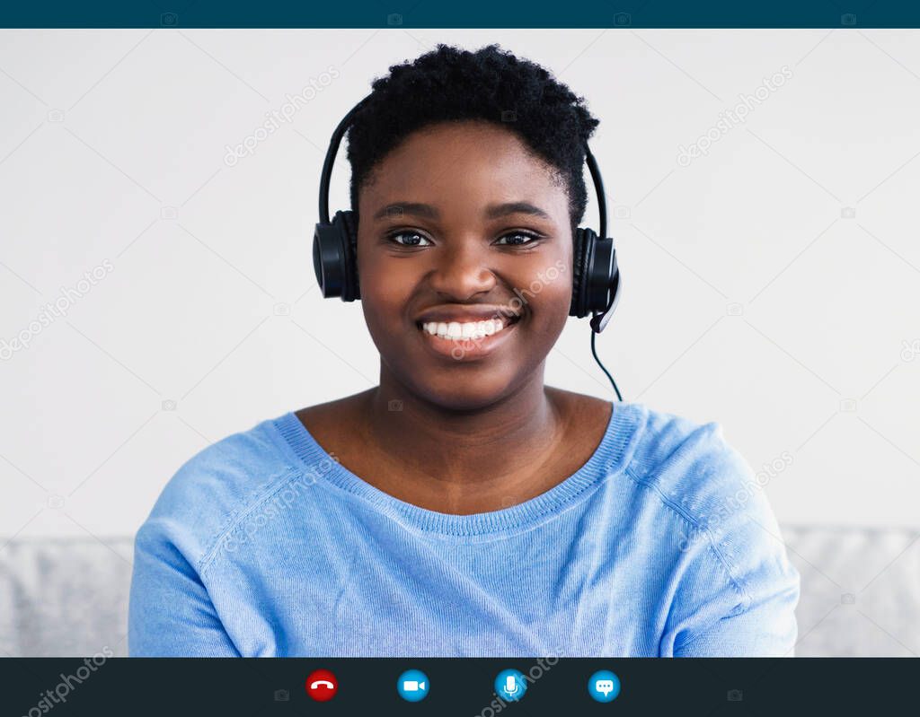 Black Woman Wearing Headset Having Video Call