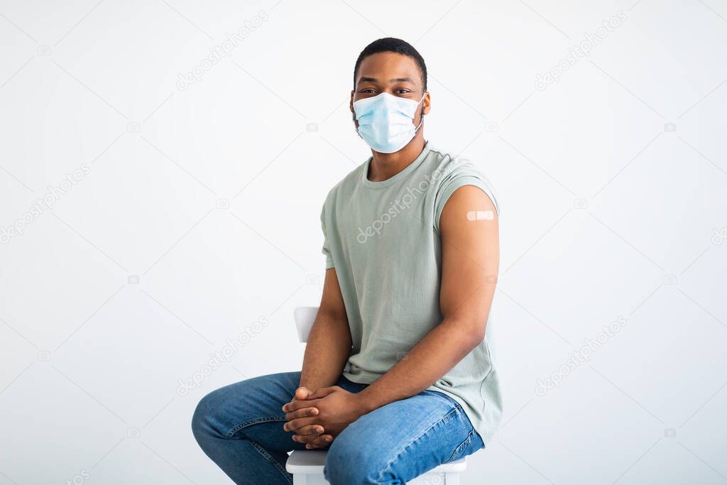 Covid-19 Vaccinated African American Man Posing Wearing Mask, White Background
