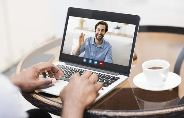 Remote Communication. Unrecognizable Black Man With Laptop Having Video Call With Friend