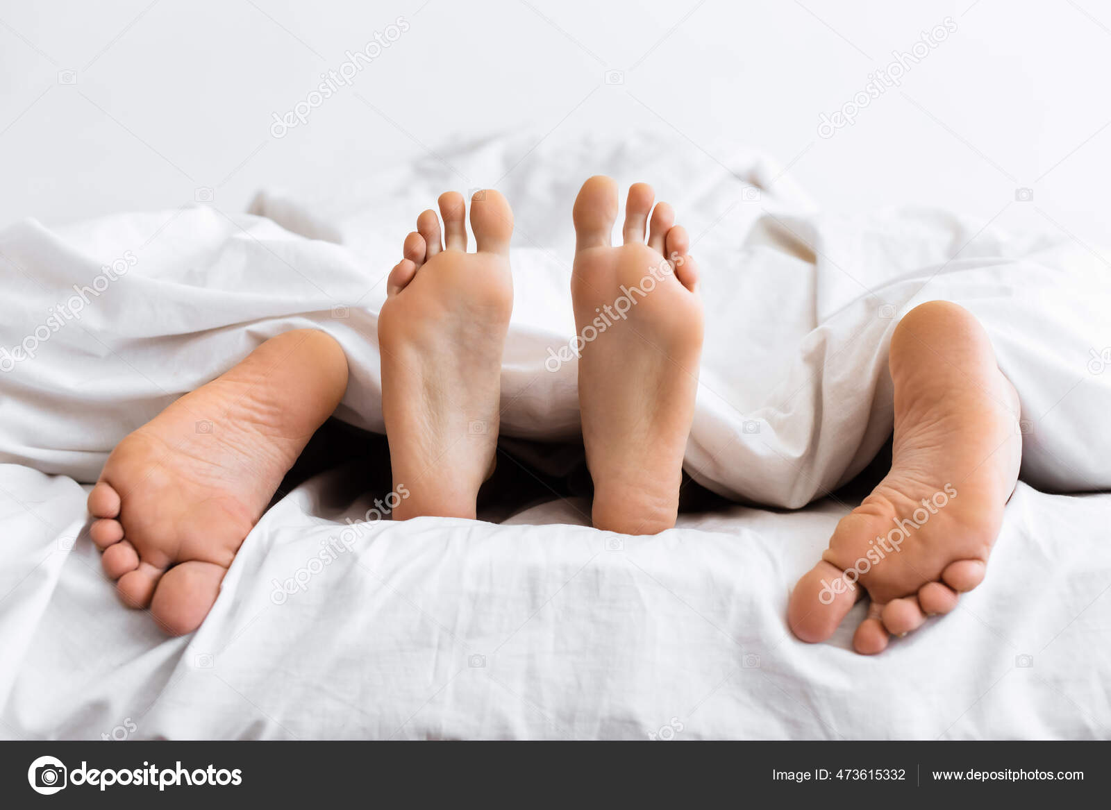 Married Couple Having Sex Lying Under Blanket In Bed Indoor Stock Photo by ©Milkos 473615332 image photo