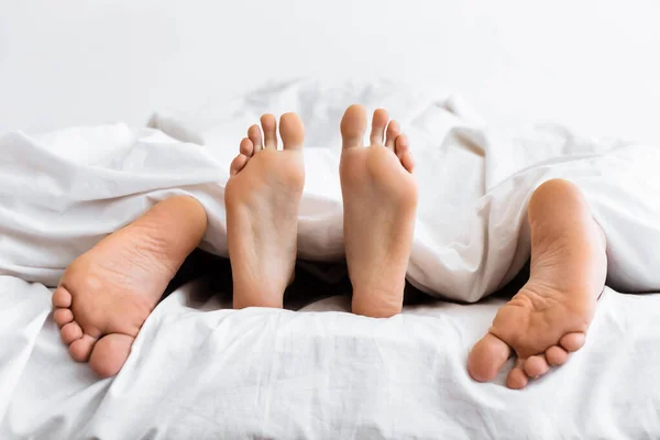 Married Couple Having Sex Lying Under Blanket In Bed Indoor — Stock Photo, Image