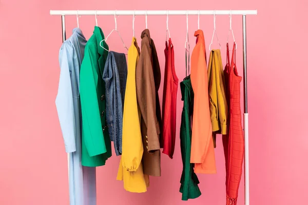 Conceptual Shot Of Clothing Rail With Trendy Clothes, Pink Background — Stock Photo, Image