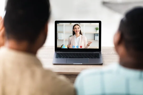 African American Couple Consulting Distantly Via Video Call Indoor, Rear-View — Stock Photo, Image
