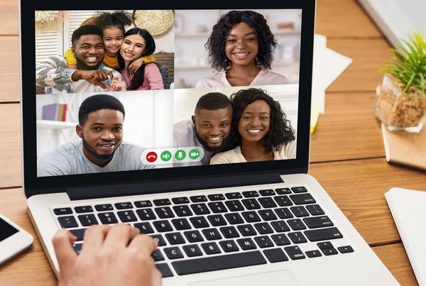 Extended black family having group video call to their relative on laptop computer, indoors — Stock Photo, Image